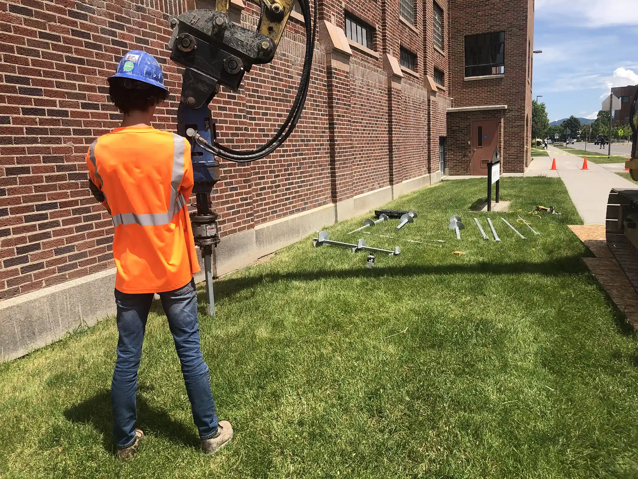 Romney Hall renovation engineering project with construction worker on the Montana State University campus in Bozeman, Montana.